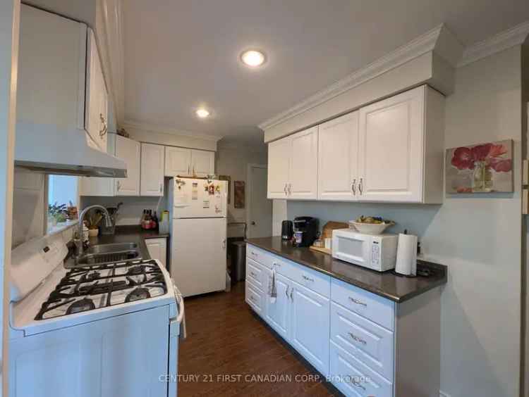 Cozy Brick Bungalow Main Floor Living 3 Bedrooms Large Yard