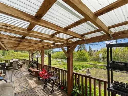2.08 Acre Homestead with Main House and Log Cabin For Sale