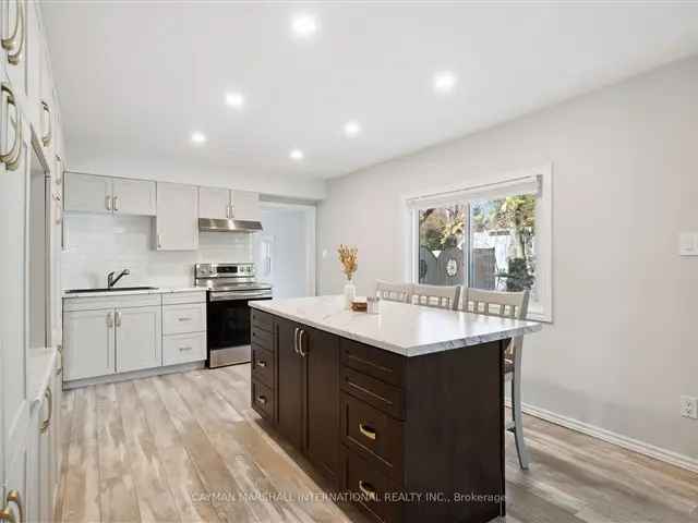 Contemporary Home with Sleek Kitchen and Finished Mudroom