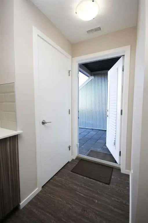 Cozy one bedroom end unit townhome for sale in Calgary with patio