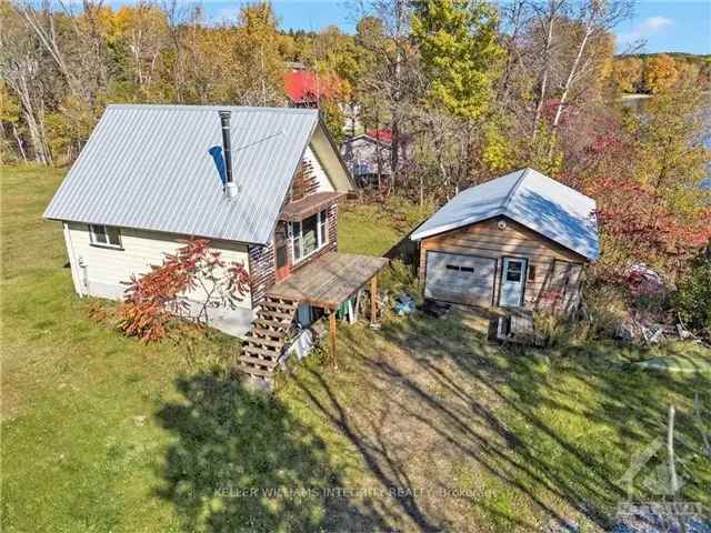 Lakefront Home with Balcony and Deck - Needs TLC