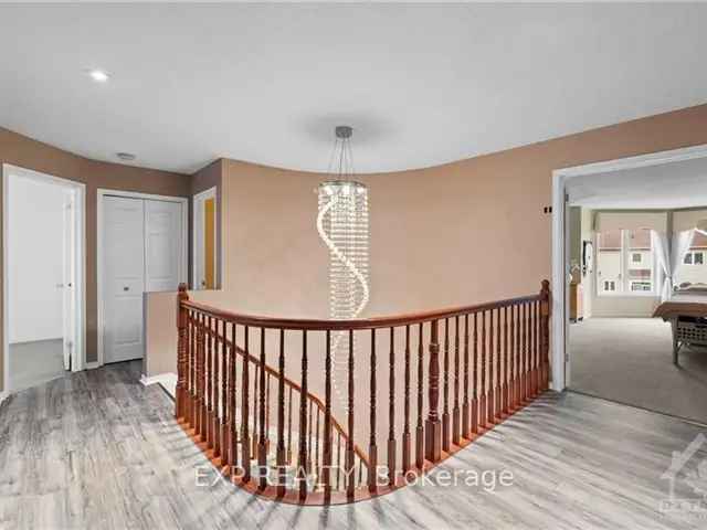 Spacious Family Home in Barrhaven with Hardwood Floors and Large Backyard