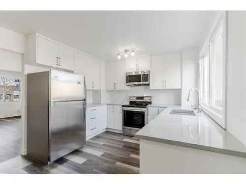 Townhouse for Sale in Vista Heights Calgary featuring Renovated Kitchen