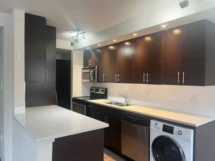 Mount Royal 1 Bedroom Corner Unit with Downtown Views