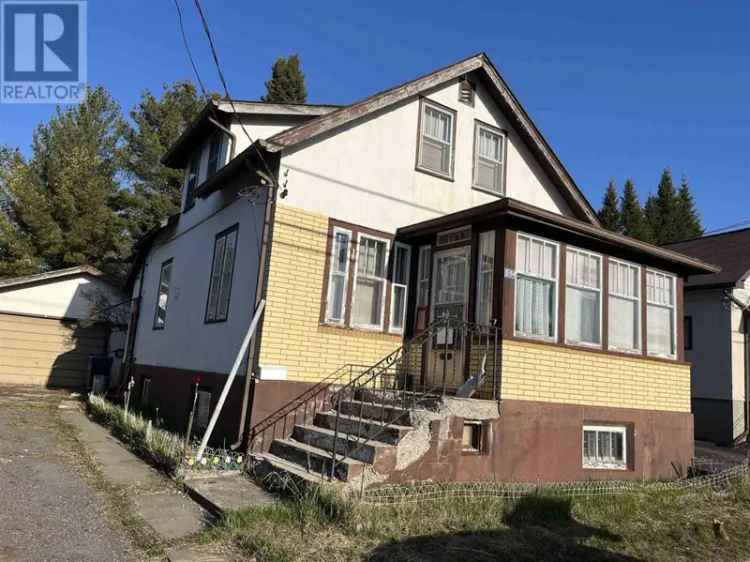 Fixer-Upper Home with Garage and Fenced Lot