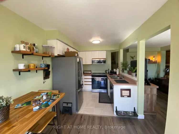 Spacious 3-Bedroom Townhouse with Finished Basement and Backyard