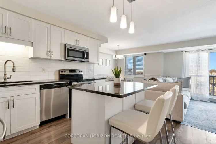 Stunning 2-Storey Condo - Open Concept, Granite Counters, Oversized Balcony