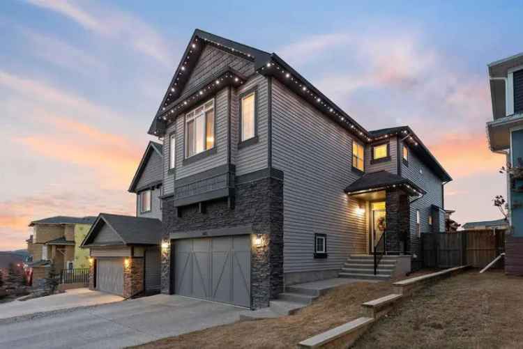 Buy Family Home with Mountain Views in Cochrane with Impressive Features