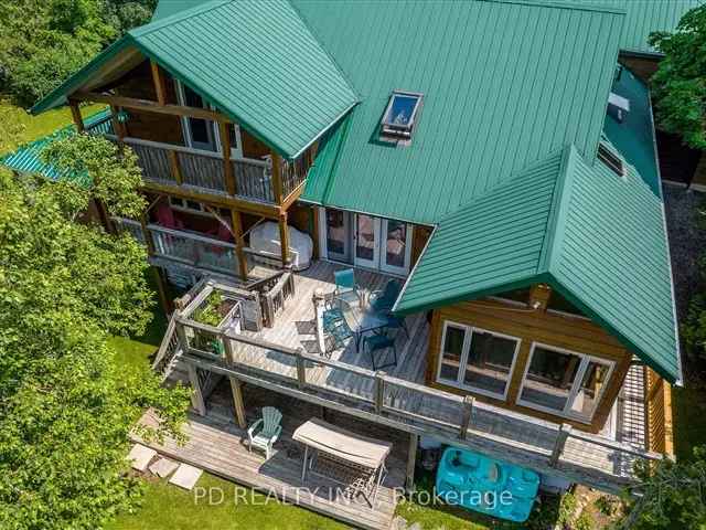 Stunning Waterfront Retreat with Two Homes on Sturgeon Lake