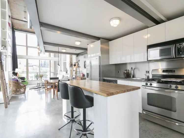 South Granville 1-Bed+Den Penthouse Loft