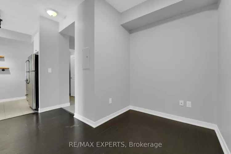 Rent Ground-Floor Condo in Burlington with Private Balcony and Den