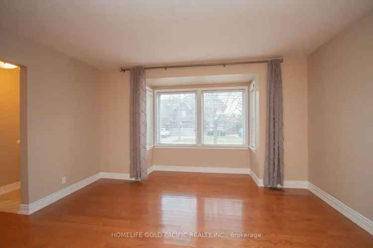 Buy Detached Home in North York with Spacious Kitchen and Large Deck