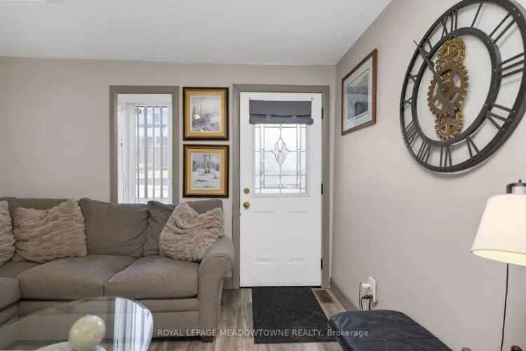 Updated Detached Home with Oversized Garage and Private Backyard