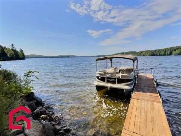 Waterfront Bungalow for Sale Laurentides Two Bedrooms Cozy Retreat