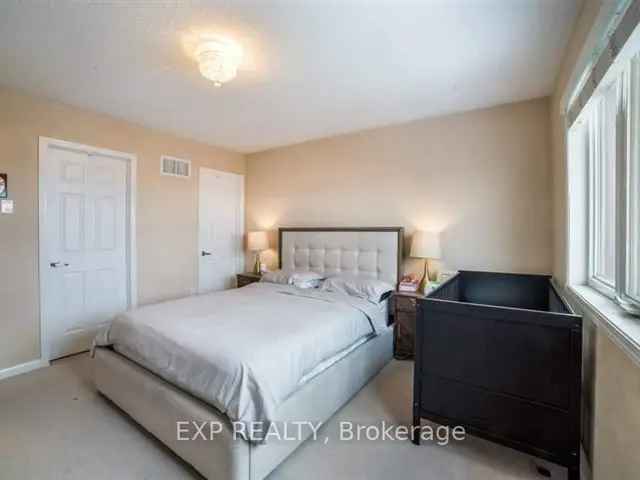 Spacious End Unit Townhome with Premium Lot and Many Upgrades