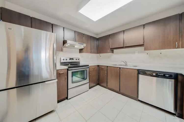 Spacious 2 Bed 2 Bath Ground Floor End Unit with Flex Room and Patio