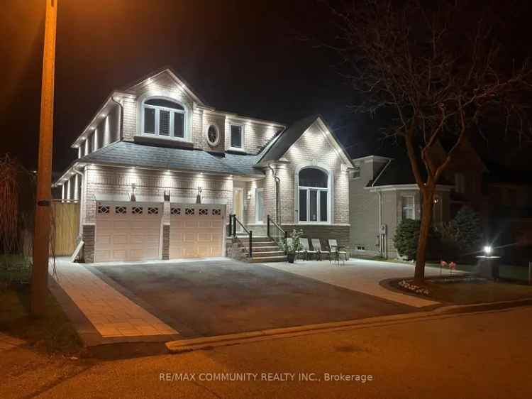 Spacious Home with Chef's Kitchen and 6 Car Parking Near Hwy 407