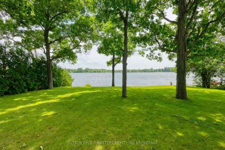 Buy waterfront log home on Varty Lake with lake views and modern amenities