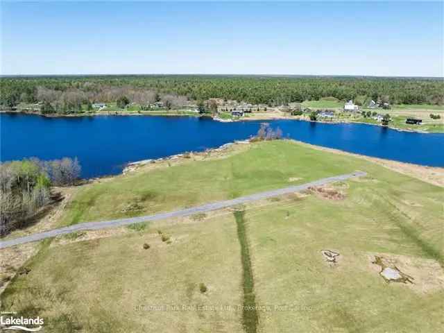 3-Acre Waterfront Property on Doe Lake - Stunning Sunsets and Panoramic Views