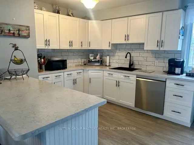 3-Bedroom Bungalow with Inground Pool and Workshop