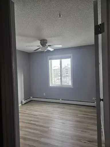 Rent 2 Bedroom Apartment in Airdrie with Shared Spaces