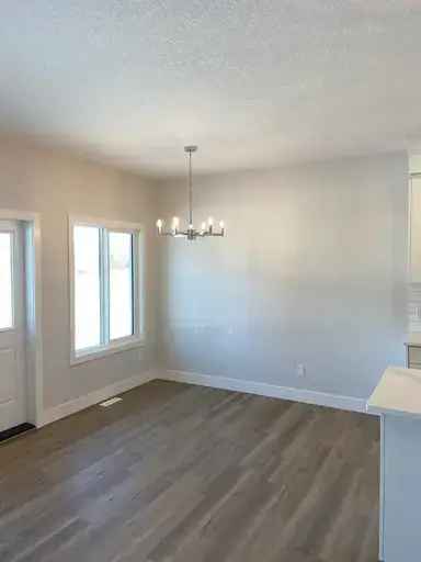 Rent 3 Bedroom Suite in Spruce Grove with Private Yard and Amenities