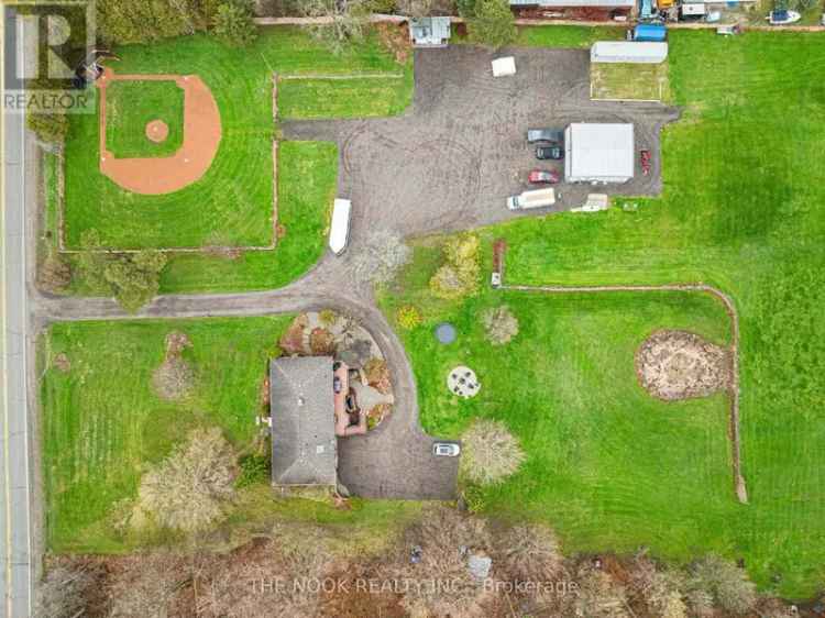 10 Acre Country Retreat w Baseball Diamond, Shop & In-Law Suite