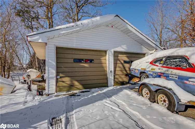 2-Bedroom Bungalow with 8-Car Parking and Detached Garage