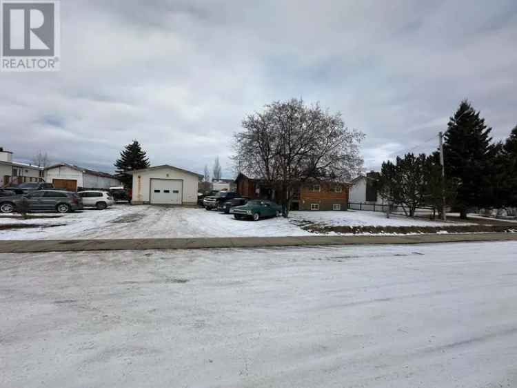 4-Bedroom Log Home with Detached Shop on Double Lot