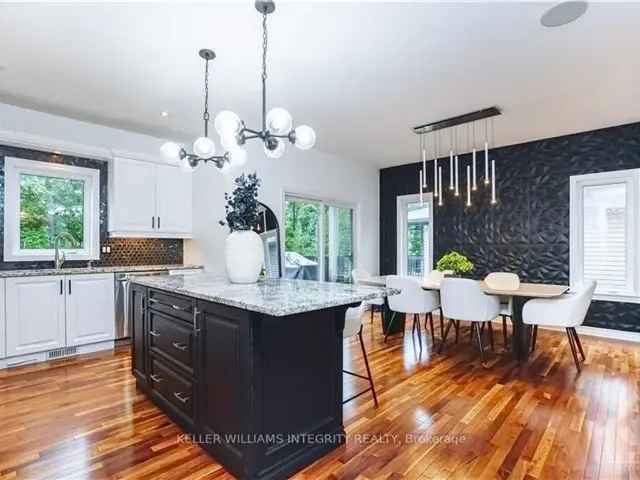 Luxury 4 Bed 4 Bath Home with In-Law Suite and Wooded Ravine Views