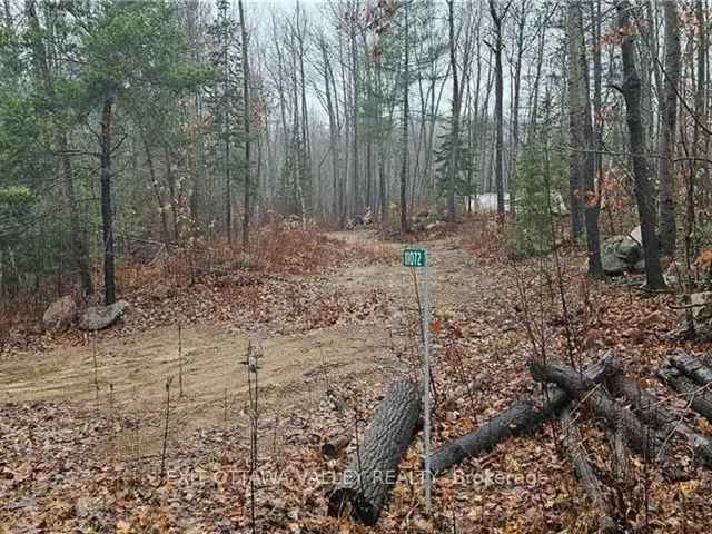 1-Acre Off Grid Lot Peaceful Treed Setting Near Small Lake