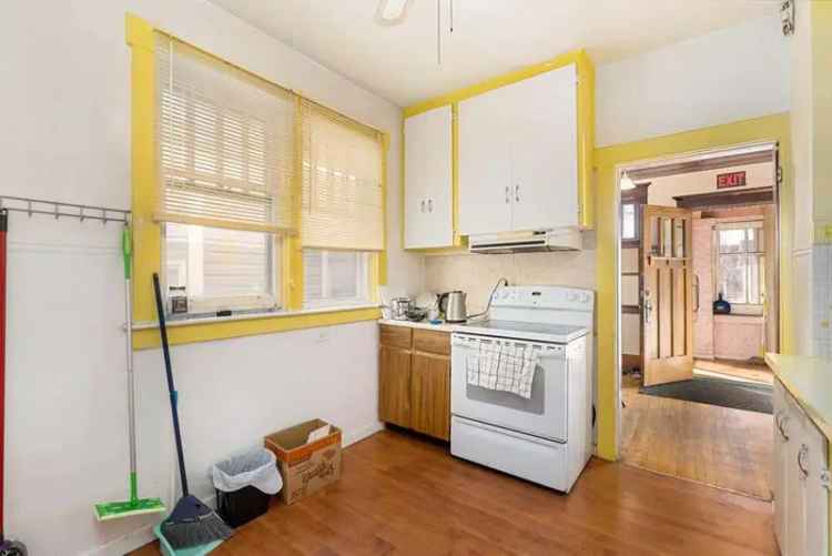 Crescent Heights Investment Property M-C2 Zoning Bungalow Redevelopment Potential