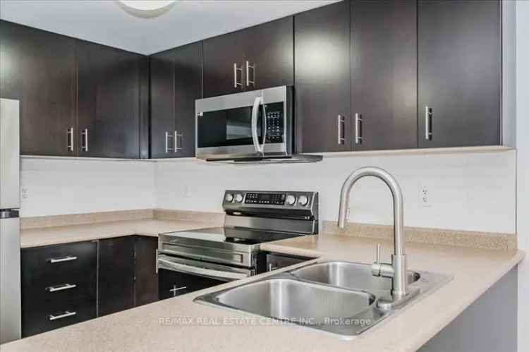 Buy 2 Bedroom Condo in Guelph with Den and Private Balcony