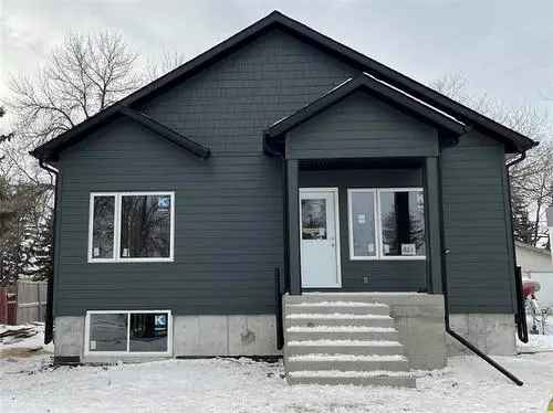 Custom Raised Bungalow with Secondary Suite For Sale