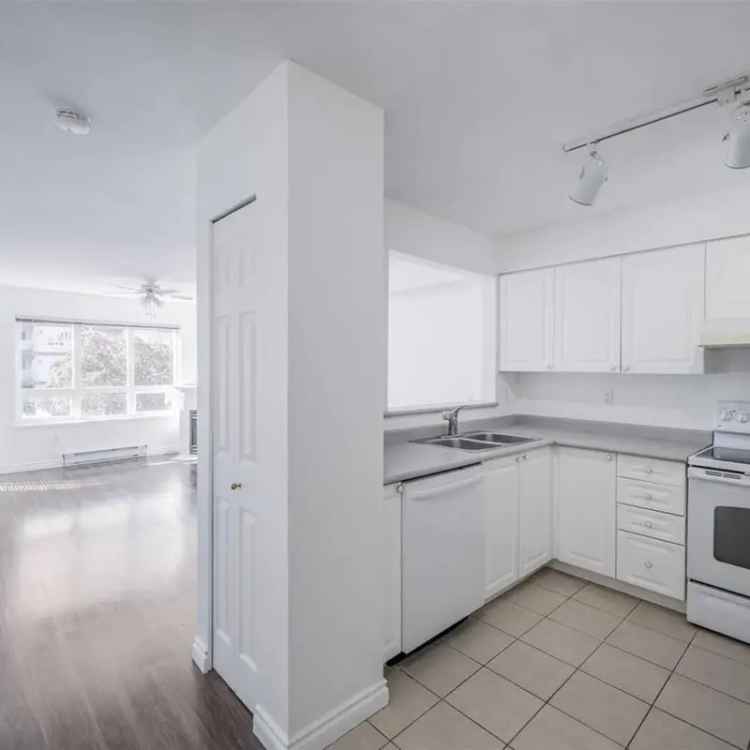 2 Bedroom Corner Unit Under 500K - Updated and Centrally Located