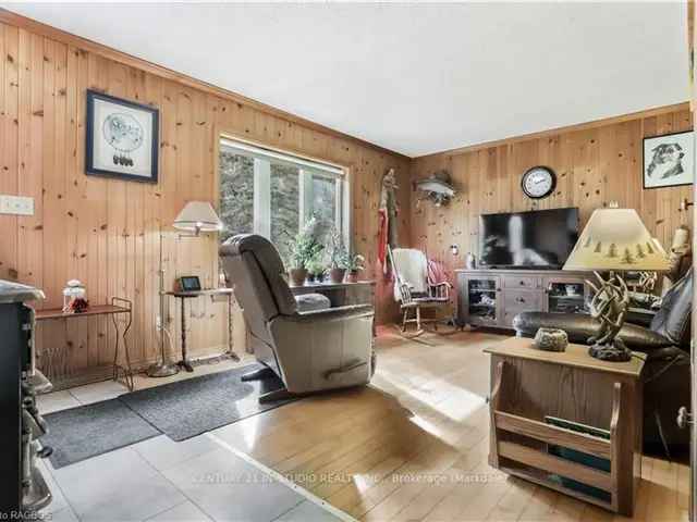 10-Acre Bungalow with 3-Season Sunroom and Many Features