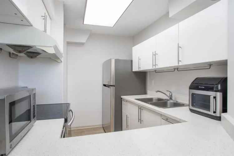 2 Bed 1.5 Bath Sub Penthouse Condo in Burnaby with Mountain Views