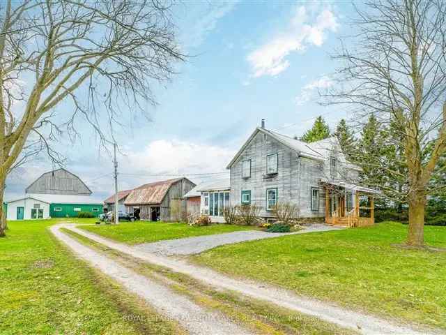 108 Acre Farm with 1880 Home and Barns