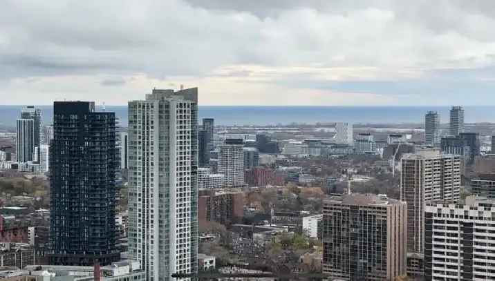 Yonge / bloor condo assignment w lake and rosedale views