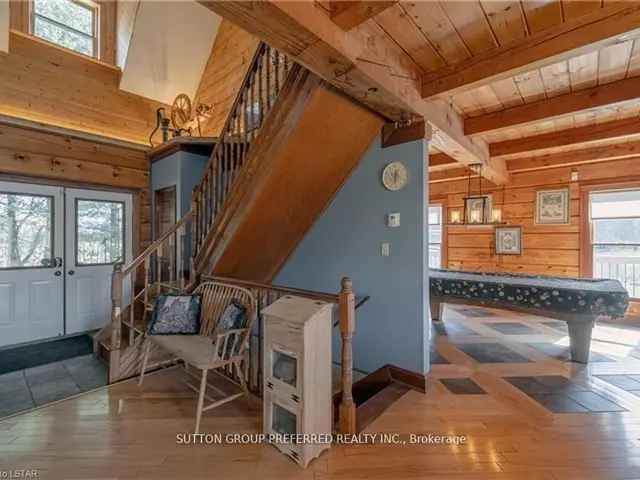 Eco-Efficient Log Home on 51.4 Acres with Shop and River Frontage