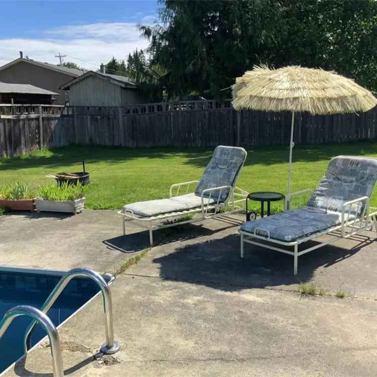 Family Home with Pool and Large Backyard