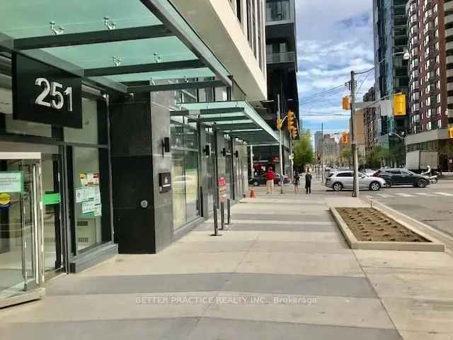 Dundas Square Garden Condo: Modern Amenities, Lake Views