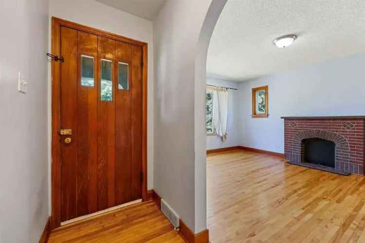 Charming Bungalow with Legal Basement Suite - Great Investment