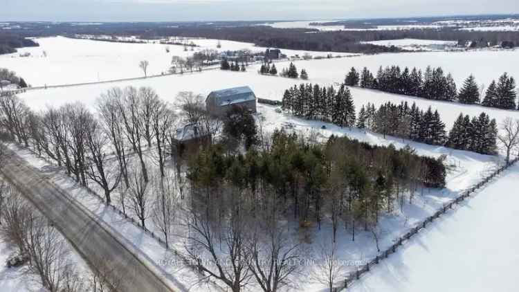 50-Acre Farm with Restored Century Home and Barns