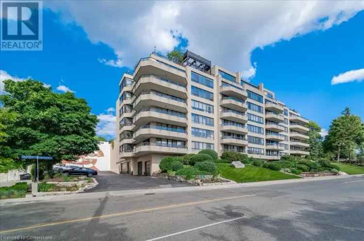 Queens Heights Condo: 2 Beds, 2 Baths, Updated Kitchen, 2 Parking Spots