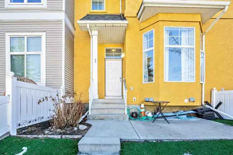 Buy Townhome in McKenzie Towne with Spacious Living Areas and Garden