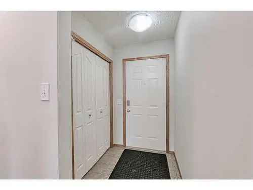 Townhouse for Sale in McKenzie Lake Calgary with Modern Updates