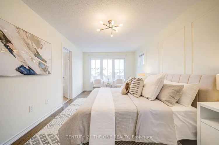 Rent spacious 4-bedroom townhome in a prime location with upgrades