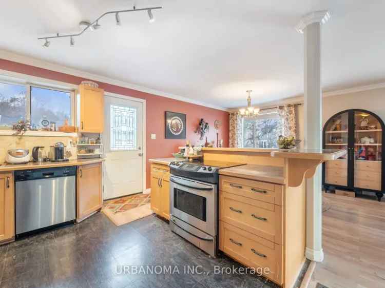 Buy Bungalow in Aurora with Spacious Primary Suite and Finished Basement