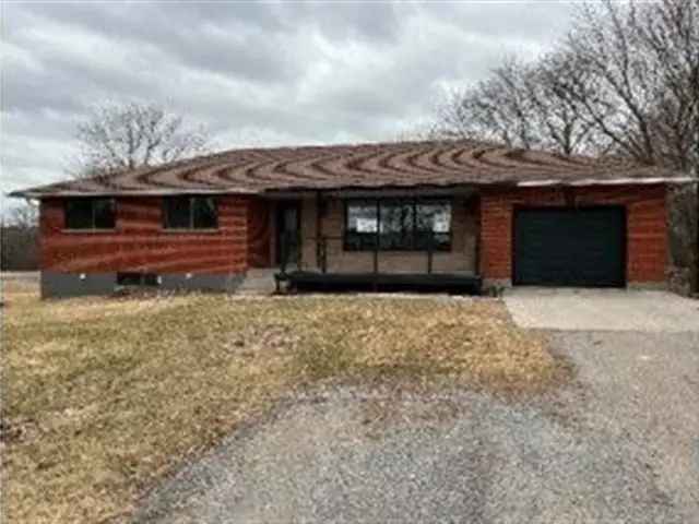 4-Bedroom Home with Development Potential Near Highway 407